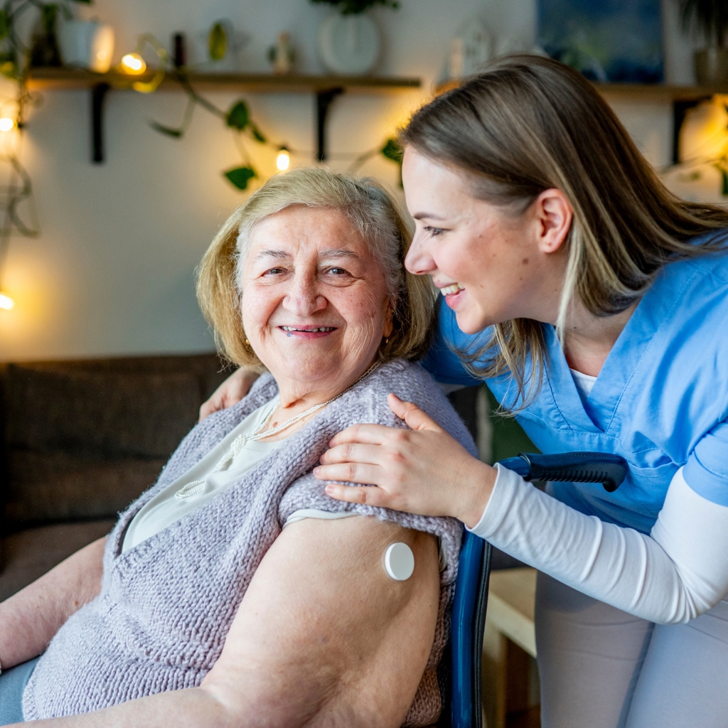 A caregiver supporting a resident with their daily routine