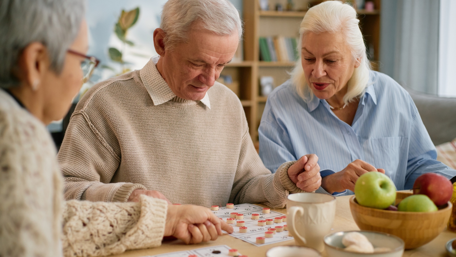 Caregiver sharing a compassionate moment with senior resident